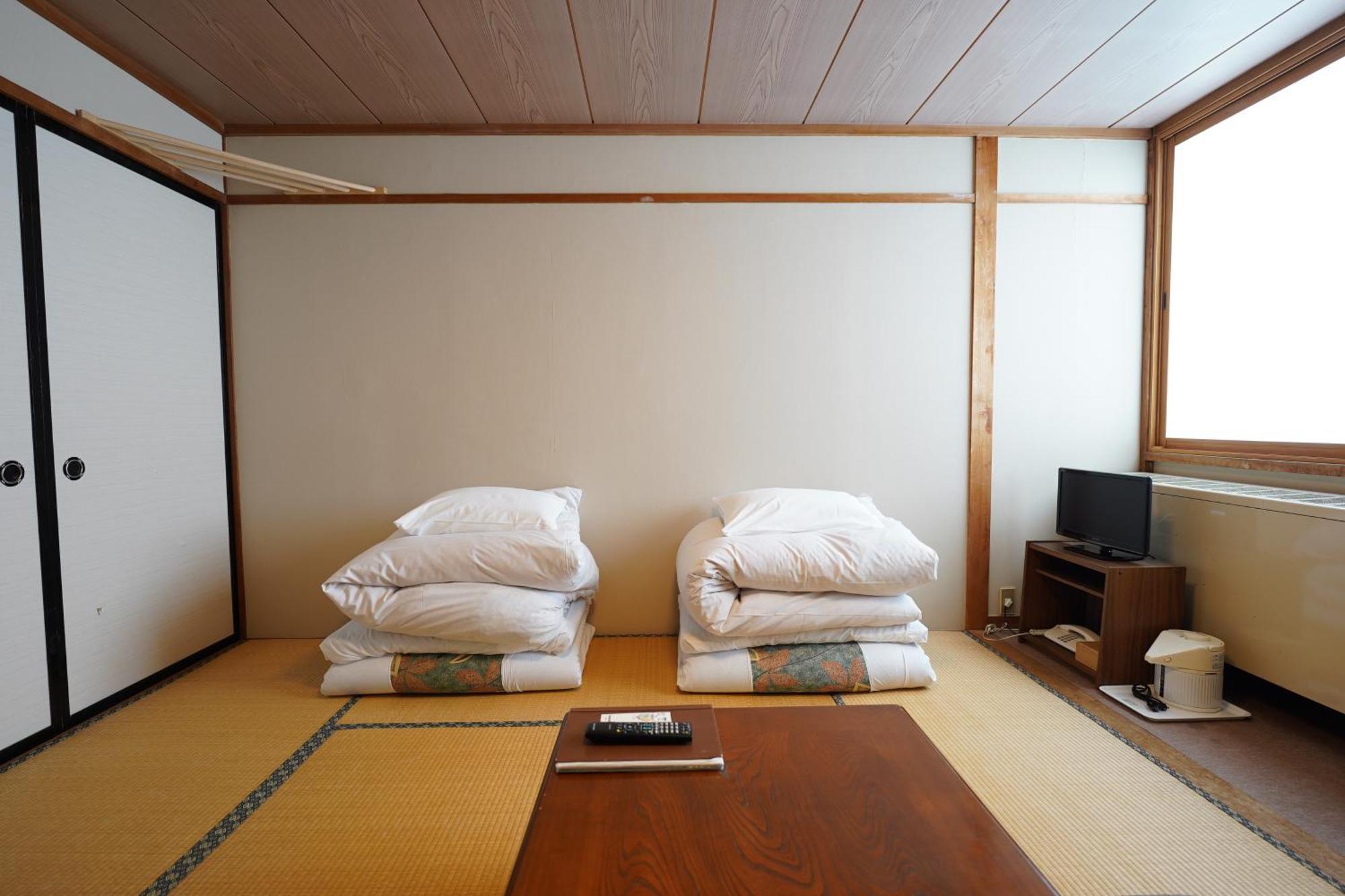 Lodge Denbey Nozawaonsen Habitación foto